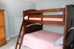 Upper level bunk room with double bunk beds